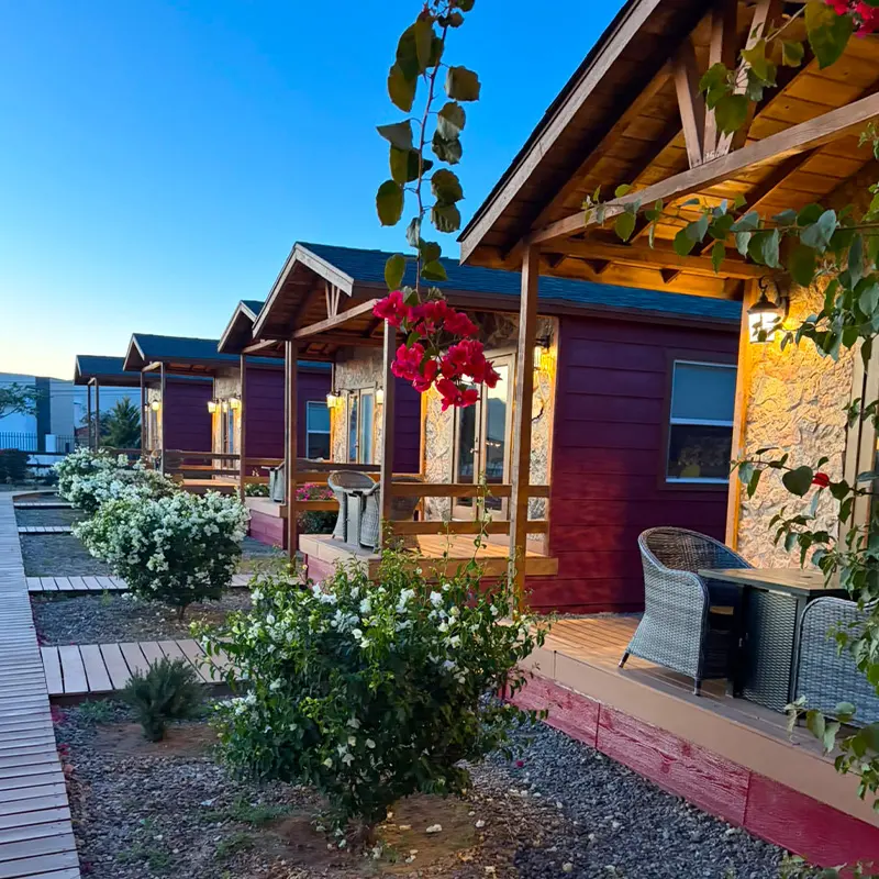 Romantic cabin terrace with private fireplace at Tres Vides in Valle de Guadalupe